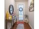 Bright and spacious entryway with decorative console table and mirror at 2354 Attewood Dr, Buford, GA 30519