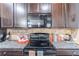 Well-equipped kitchen with granite countertops and ample cabinet space at 2354 Attewood Dr, Buford, GA 30519