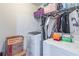 Convenient laundry room with washer, dryer and shelving at 2354 Attewood Dr, Buford, GA 30519