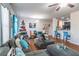 Spacious living room with hardwood floors and a cozy seating area at 2354 Attewood Dr, Buford, GA 30519
