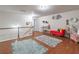 Spacious loft area with hardwood floors and stylish decor at 2354 Attewood Dr, Buford, GA 30519