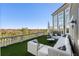 Spacious balcony with white sectional sofa and stunning view at 1055 Leadenhall St, Alpharetta, GA 30022