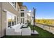 View of backyard and balcony with sectional sofa at 1055 Leadenhall St, Alpharetta, GA 30022