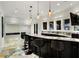 Basement bar with granite countertop and seating at 1055 Leadenhall St, Alpharetta, GA 30022