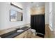 Bathroom with granite countertop, shower, and toilet at 1055 Leadenhall St, Alpharetta, GA 30022