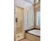 Modern bathroom with walk-in shower, marble accents, and a built-in niche at 1055 Leadenhall St, Alpharetta, GA 30022