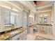 Elegant bathroom with granite countertops, large soaking tub, and custom cabinetry at 1055 Leadenhall St, Alpharetta, GA 30022