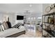 Bright bedroom with a large TV, sitting area, and stunning views at 1055 Leadenhall St, Alpharetta, GA 30022