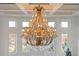 Large crystal chandelier in a bright room at 1055 Leadenhall St, Alpharetta, GA 30022