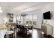 Elegant dining room with large windows and chandelier at 1055 Leadenhall St, Alpharetta, GA 30022