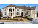 Grand home with impressive columns and landscaping at 1055 Leadenhall St, Alpharetta, GA 30022