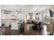 Modern kitchen with large island and breakfast bar at 1055 Leadenhall St, Alpharetta, GA 30022