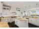 Spacious kitchen with island, granite counters, and breakfast area at 1055 Leadenhall St, Alpharetta, GA 30022