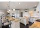 Large kitchen with granite island and breakfast bar at 1055 Leadenhall St, Alpharetta, GA 30022