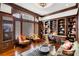 Spacious library with built-in bookshelves and hardwood floors at 1055 Leadenhall St, Alpharetta, GA 30022