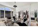 Sophisticated living room with comfortable seating and large windows at 1055 Leadenhall St, Alpharetta, GA 30022