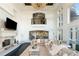 Spacious living room with fireplace and high ceilings at 1055 Leadenhall St, Alpharetta, GA 30022