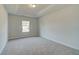 Bright bedroom with carpet and neutral walls at 301 Delta Dr, Mcdonough, GA 30252