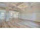 Elegant dining room with hardwood floors, chandelier, and wainscoting at 301 Delta Dr, Mcdonough, GA 30252