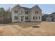 Two-story brick home with gray shutters and a landscaped lawn at 301 Delta Dr, Mcdonough, GA 30252