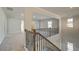 Upstairs hallway overlooking the main level at 301 Delta Dr, Mcdonough, GA 30252