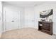 Spacious bedroom with double doors and built-in shelving at 39 Telfair Ct, Acworth, GA 30101