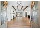 Bright and spacious entryway with exposed beams, hardwood floors, and fireplace at 39 Telfair Ct, Acworth, GA 30101