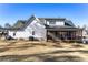 Charming home exterior with a screened porch and expansive lawn at 39 Telfair Ct, Acworth, GA 30101