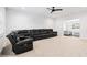 Relaxing media room with sectional sofa and carpeting at 39 Telfair Ct, Acworth, GA 30101