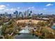 Aerial view of park, pool, and city skyline at 266 11Th Ne St # 308, Atlanta, GA 30309