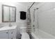 Bathroom includes a shower/tub combo and white tile at 266 11Th Ne St # 308, Atlanta, GA 30309