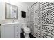 Clean bathroom with white tile and patterned shower curtain at 266 11Th Ne St # 308, Atlanta, GA 30309