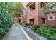 Landscaped courtyard with walking path and lush greenery at 266 11Th Ne St # 308, Atlanta, GA 30309