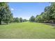 Expansive green park with trees and walking paths at 266 11Th Ne St # 308, Atlanta, GA 30309