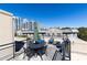 Enjoy city views from this rooftop terrace, complete with seating and a table for dining al fresco at 266 11Th Ne St # 308, Atlanta, GA 30309