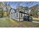 Charming house exterior with gray siding, white accents, and a deck at 2933 5Th Sw St, Atlanta, GA 30315