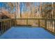 Back Deck featuring wood railings with snow covered area at 3332 Fannin Ct, Lithonia, GA 30038