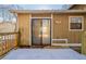 Back Deck with a sliding glass door covered in snow at 3332 Fannin Ct, Lithonia, GA 30038