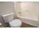 Clean bathroom featuring a shower-tub combo and modern fixtures at 3332 Fannin Ct, Lithonia, GA 30038