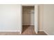 Bedroom closet featuring an open bi-fold door, neutral paint, rod, and shelf at 3332 Fannin Ct, Lithonia, GA 30038