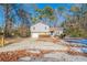 Charming two-story home with a well-maintained front yard, driveway, and beautiful surroundings at 3332 Fannin Ct, Lithonia, GA 30038