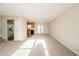 Spacious living room with stainless steel fridge, wood cabinets, and breakfast area at 3332 Fannin Ct, Lithonia, GA 30038
