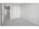 Carpeted bedroom with a closet for storage, and neutral walls at 3108-A Brownstone Se Ln, Atlanta, GA 30354