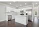 Stylish kitchen featuring granite countertops, stainless steel appliances, and white cabinetry at 3108-A Brownstone Se Ln, Atlanta, GA 30354