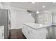 Bright kitchen featuring stainless steel appliances, granite countertops, and center island with seating at 3108-A Brownstone Se Ln, Atlanta, GA 30354