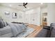 Main bedroom with a queen bed, grey accents, and access to a bathroom at 1073 Mayson Turner Nw Rd, Atlanta, GA 30314