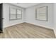 Bright bedroom featuring neutral walls and vinyl wood flooring at 2899 Gresham Se Rd, Atlanta, GA 30316