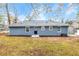 Newly painted blue house exterior with a spacious backyard at 2899 Gresham Se Rd, Atlanta, GA 30316