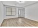 Empty living room with wood-look floors and gray walls at 2899 Gresham Se Rd, Atlanta, GA 30316