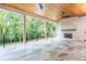 Spacious covered porch with fireplace and wood ceiling at 340 Colewood Way, Atlanta, GA 30328